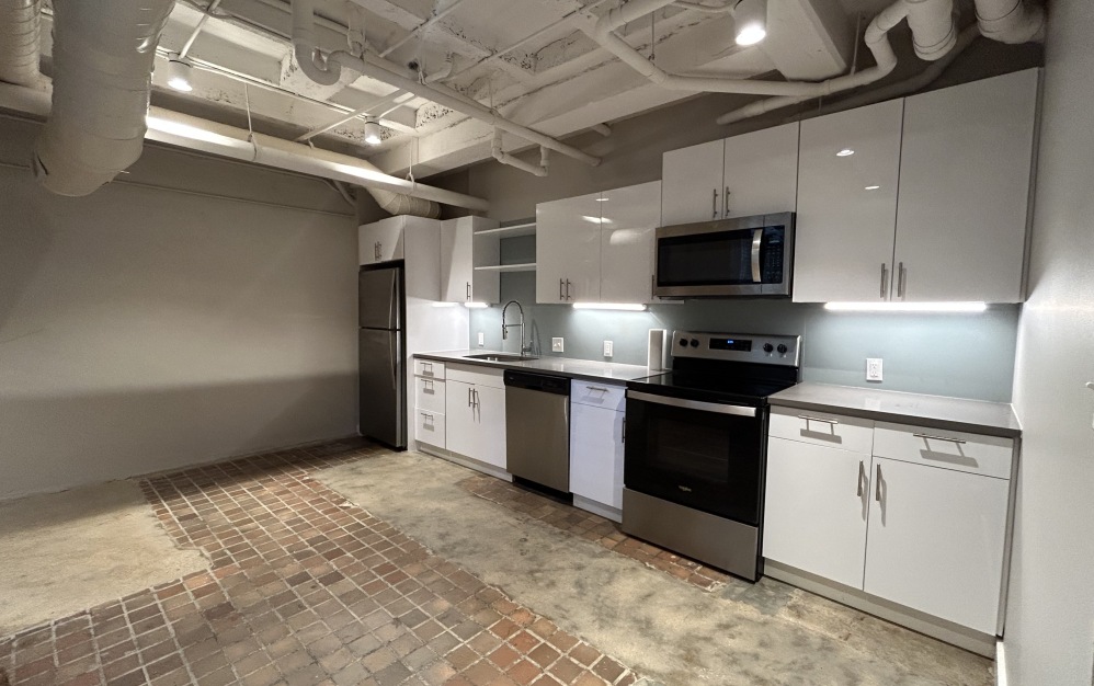 Marine Central – 002  - 1 bedroom floorplan layout with 1 bathroom and 864 square feet (Living Room 
)